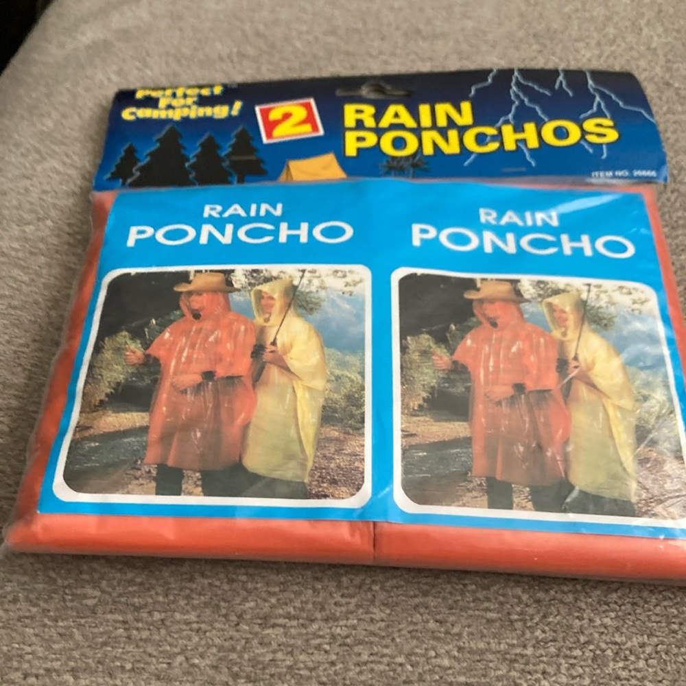 2 rain ponchos orange